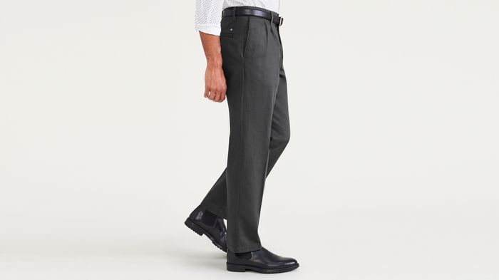 Side view of model wearing Steelhead Signature Iron Free Khakis, Pleated, Classic Fit with Stain Defender®.