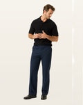 Front view of model wearing Navy Blazer Signature Iron Free Khakis, Relaxed Fit with Stain Defender®.