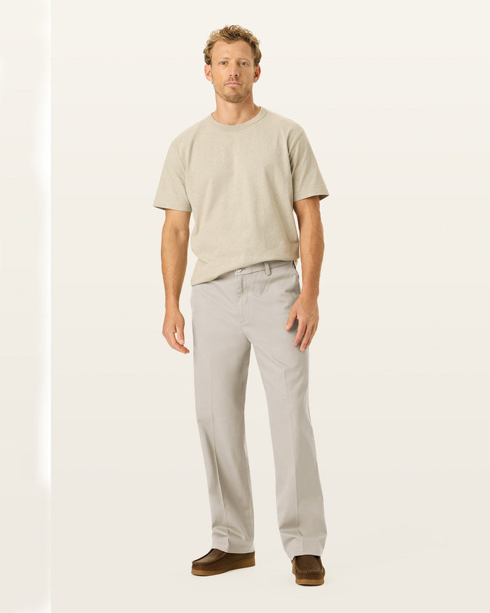 Front view of model wearing Cloud Signature Iron Free Khakis, Relaxed Fit with Stain Defender®.