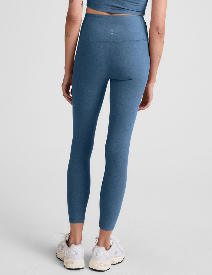 blue high-waisted midi length legging.