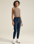 Navy Spacedye Commuter Midi Jogger with high-waisted drawstring and slim fit, shown on a model with banded cuffs.