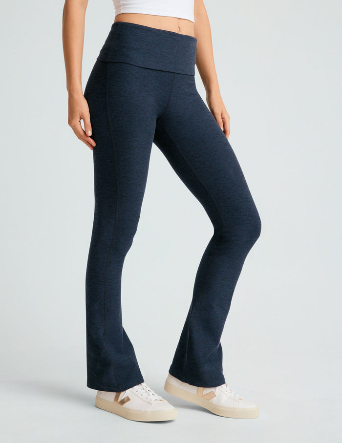 Model wears Navy Spacedye Foldover Bootcut Pant with a marled texture, high foldover waistband, and flared ankles.