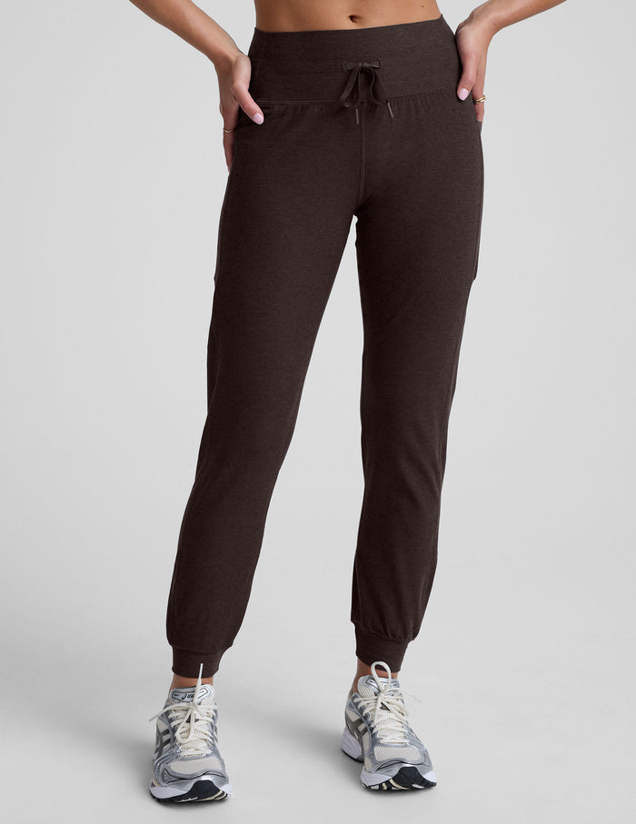 Brown Spacedye Go Pocket Jogger with a high drawstring waist, side pockets, and cuffed ankles, shown on a model.