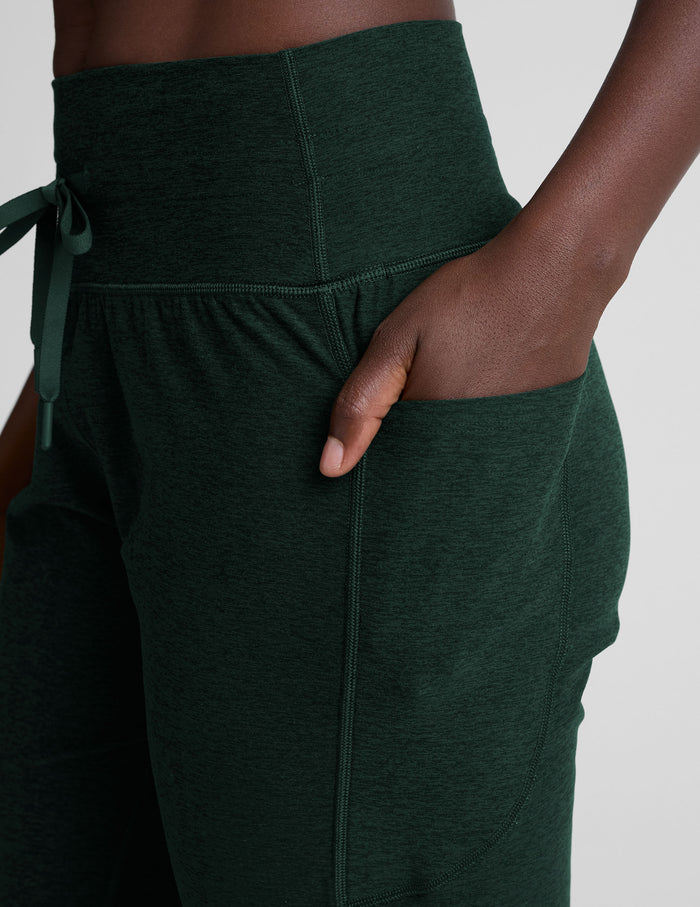Close-up of emerald green Spacedye Go Pocket Jogger featuring a high waistband, drawstring tie, and side drop-in pocket.