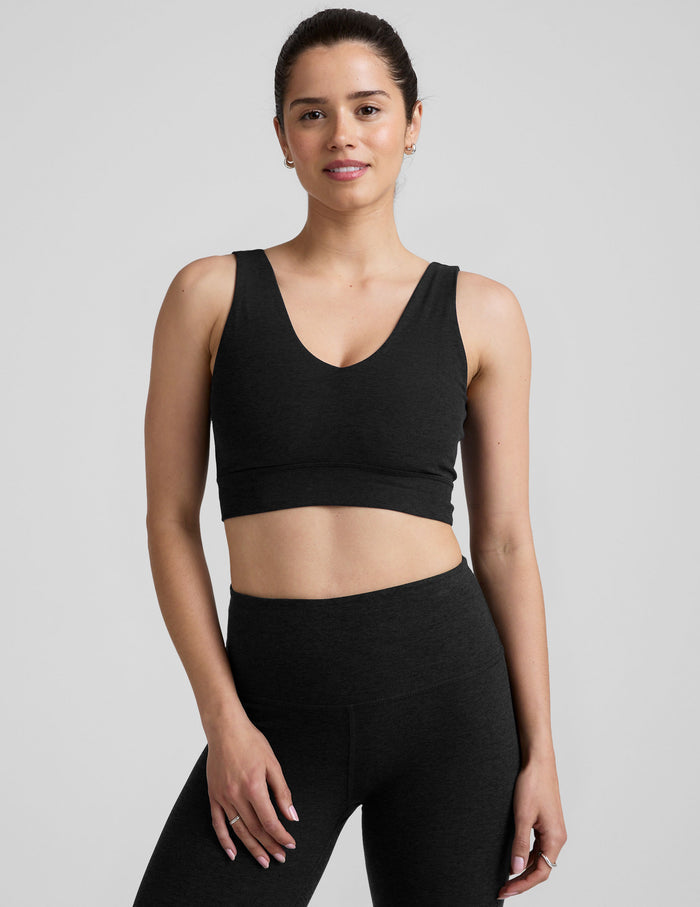 black long line style bra with a front and back v-neck.