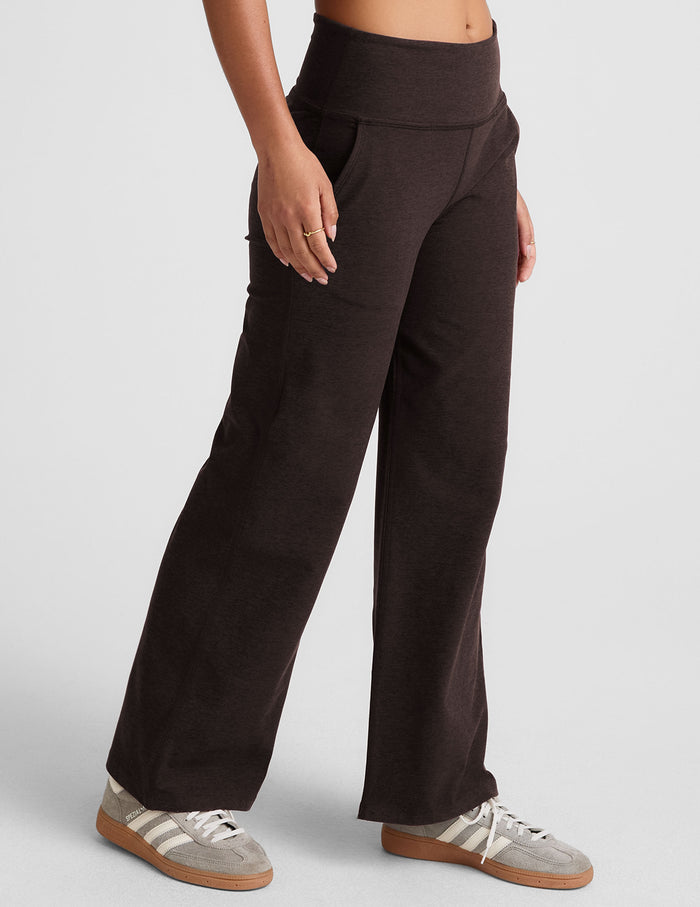 Woman wearing Brown Spacedye Laid Back Wide Leg Pant with slant pockets, paired with grey sneakers.