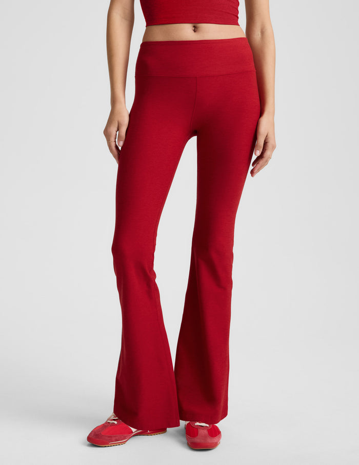 Red Spacedye Mid-Rise Bootcut Pant with a wide waistband and flared leg, shown on a model from the waist down.