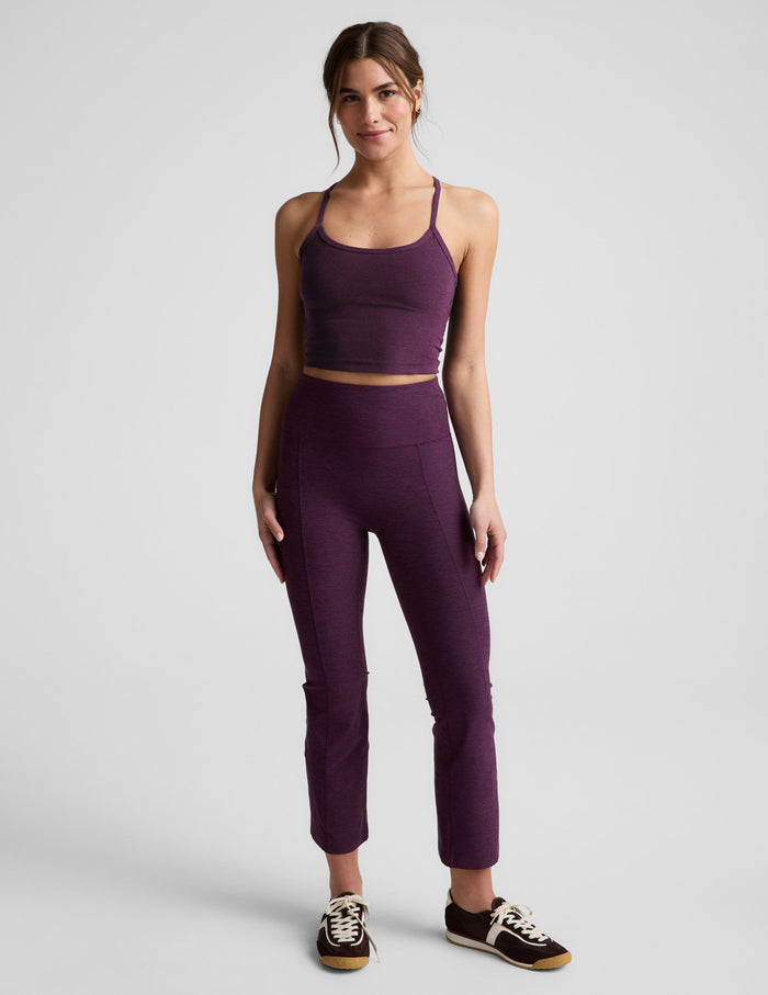 Woman wearing Purple Spacedye™ Pintuck Kick Flare High Waisted Pant with a matching crop tank and sneakers.