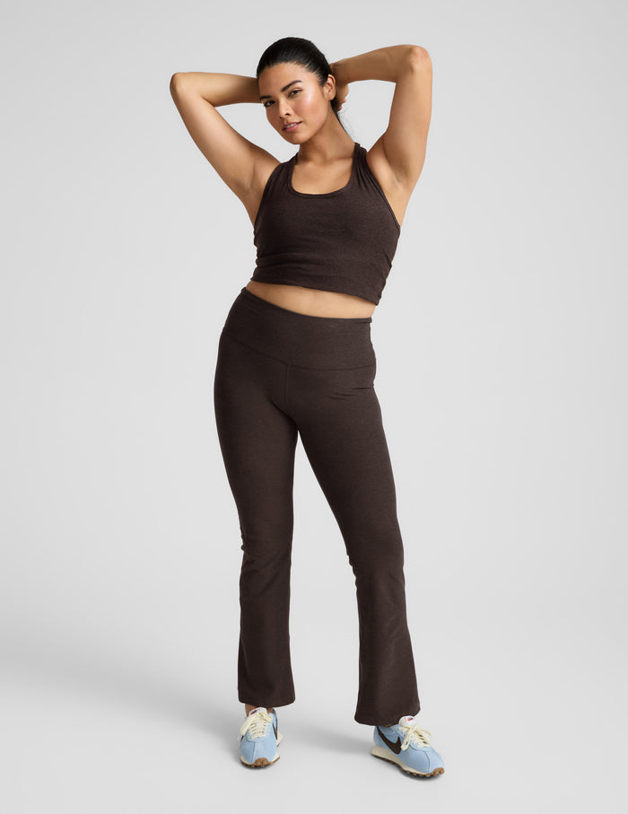 Woman wearing brown marled Spacedye Practice High Waisted Bootcut Pant with flared legs and a matching top in a studio pose.
