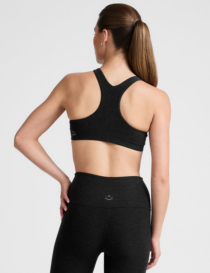 black high-neck racerback bra.