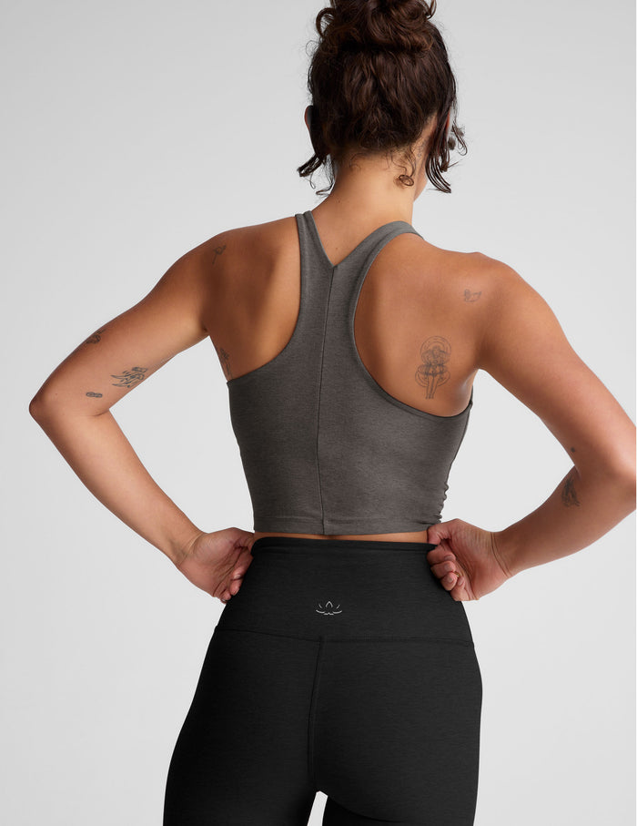 gray cropped tank top with a high scoop neckline.