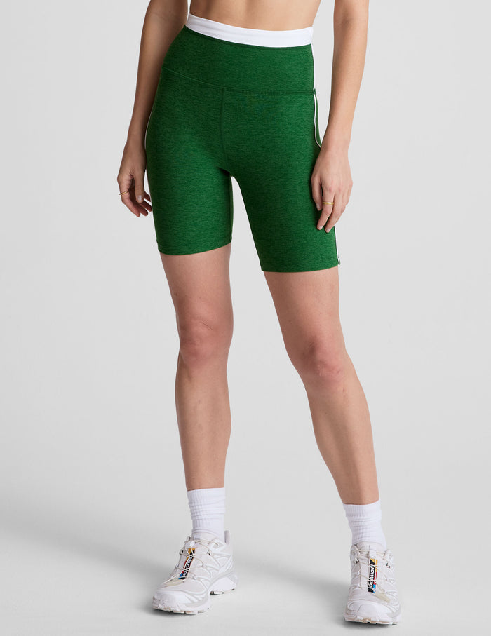 Emerald green Spacedye Trophy 5" Short featuring a white colorblock high waistband and side piping on a front-facing model.