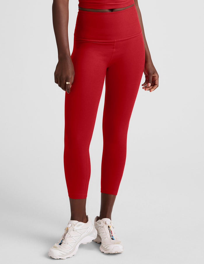 Spacedye Walk And Talk High Waisted Capri Legging in red, featuring a wide waistband and snug fit on a model.