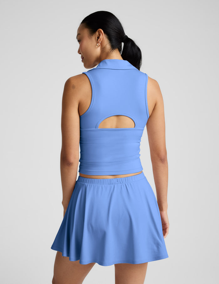 Back view of the blue Sport Active Drawcord Mini Skirt, a relaxed A-line style with a gathered elastic waistband.