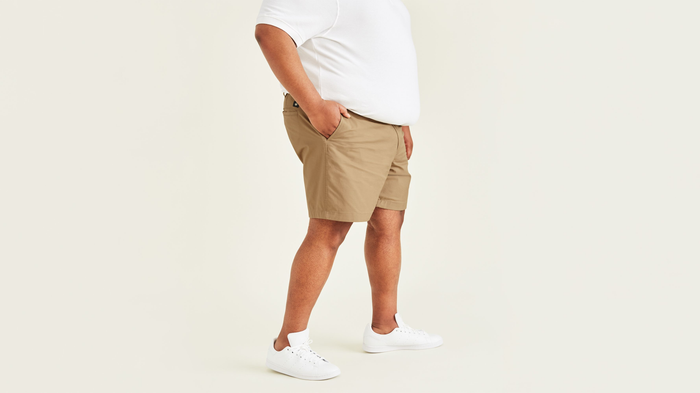 Side view of model wearing New British Khaki Ultimate 9.5" Shorts (Big and Tall).