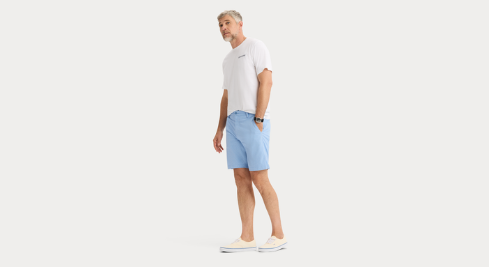 View of model wearing Vista Blue Ultimate 9.5" Shorts, Straight Fit.