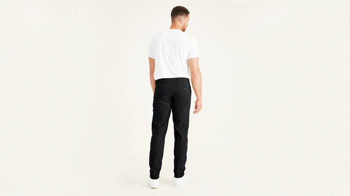 Back view of model wearing Black Ultimate Chinos, Athletic Fit (Big and Tall).