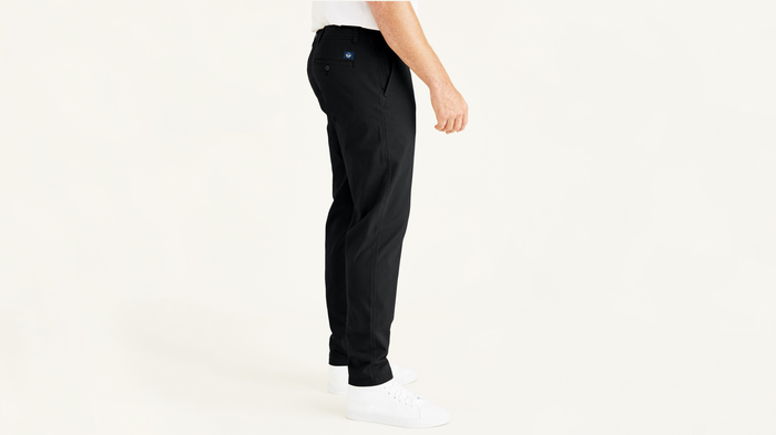 Side view of model wearing Black Ultimate Chinos, Athletic Fit (Big and Tall).