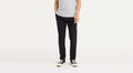 Front view of model wearing Black Ultimate Chinos, Athletic Fit.