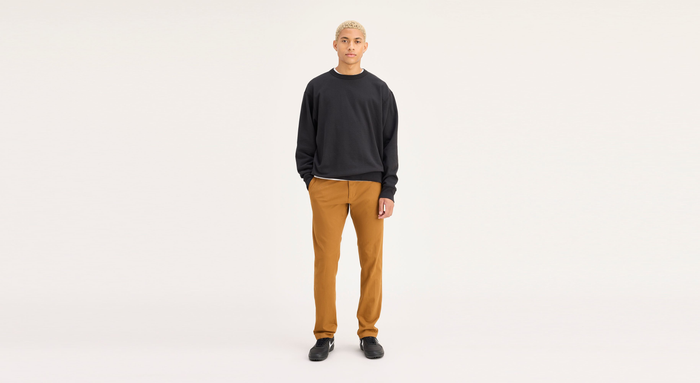 Front view of model wearing Dark Ginger Ultimate Chinos, Athletic Fit.