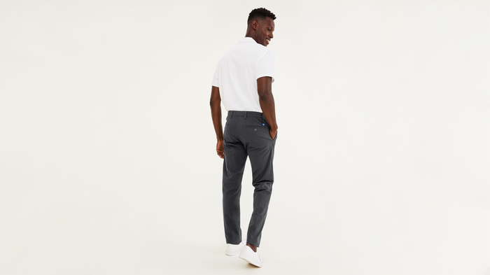 Back view of model wearing Steelhead Ultimate Chinos, Athletic Fit.
