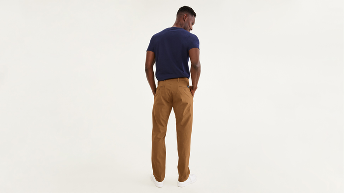 Back view of model wearing Dark Ginger Ultimate Chinos, Athletic Fit.