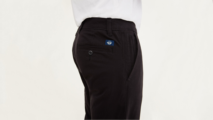 View of model wearing Black Ultimate Chinos, Athletic Fit.