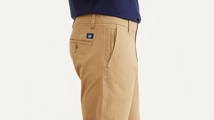 View of model wearing New British Khaki Ultimate Chinos, Athletic Fit.