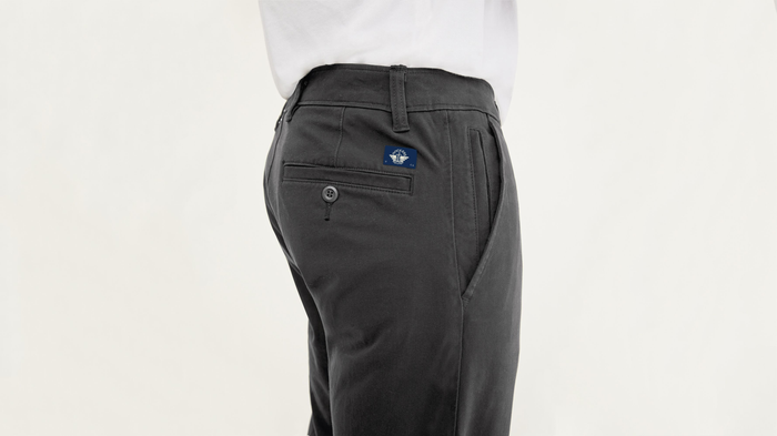 View of model wearing Steelhead Ultimate Chinos, Athletic Fit.