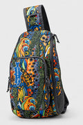 Colorful patterned sling bag on a white background