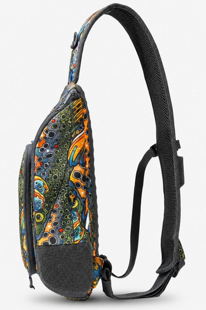 Colorful patterned sling bag on a white background
