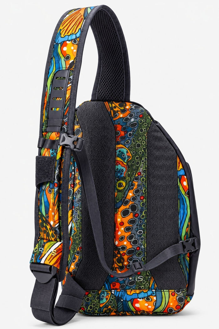 Colorful sling bag with abstract design on a white background