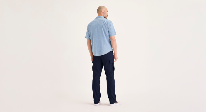 Back view of model wearing Navy Blazer Utility Cargo Pant, Straight Fit.