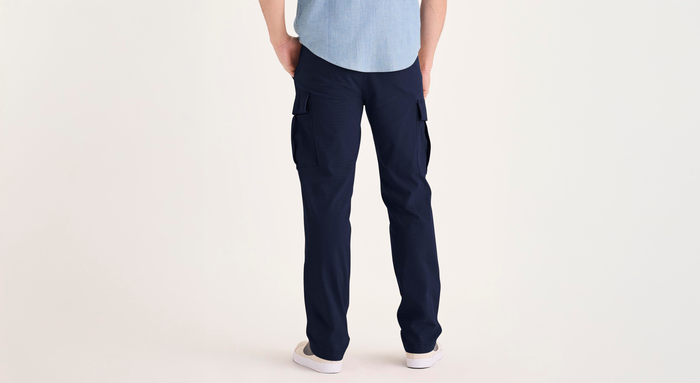 Back view of model wearing Navy Blazer Utility Cargo Pant, Straight Fit.