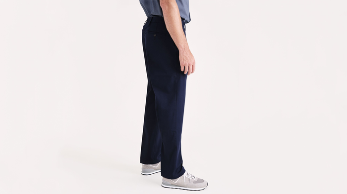 Side view of model wearing Pembroke Workday Khakis, Classic Fit (Big and Tall).