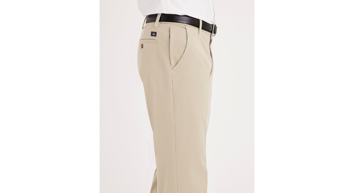 Side view of model wearing Safari Beige Workday Khakis, Classic Fit (Big and Tall).