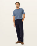 Front view of model wearing Pembroke Workday Khakis, Classic Fit.