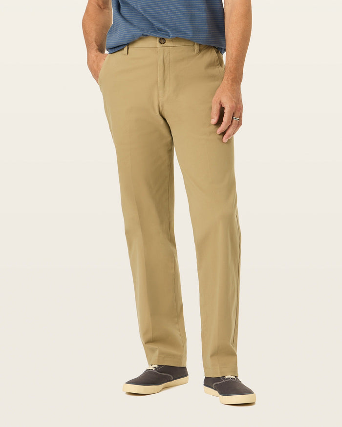 Back view of model wearing New British Khaki Workday Khakis, Classic Fit.