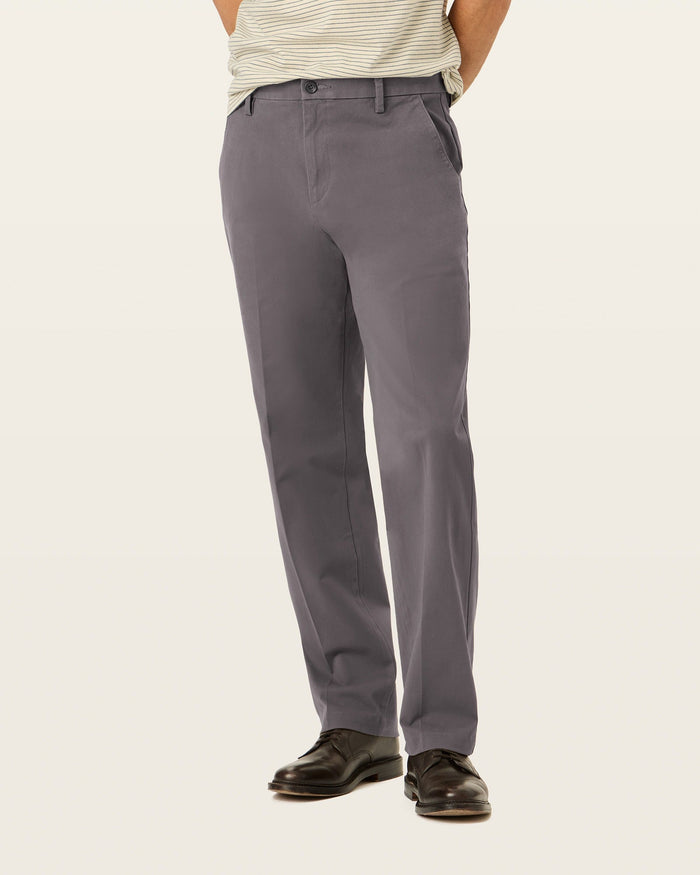 Back view of model wearing Storm Workday Khakis, Classic Fit.