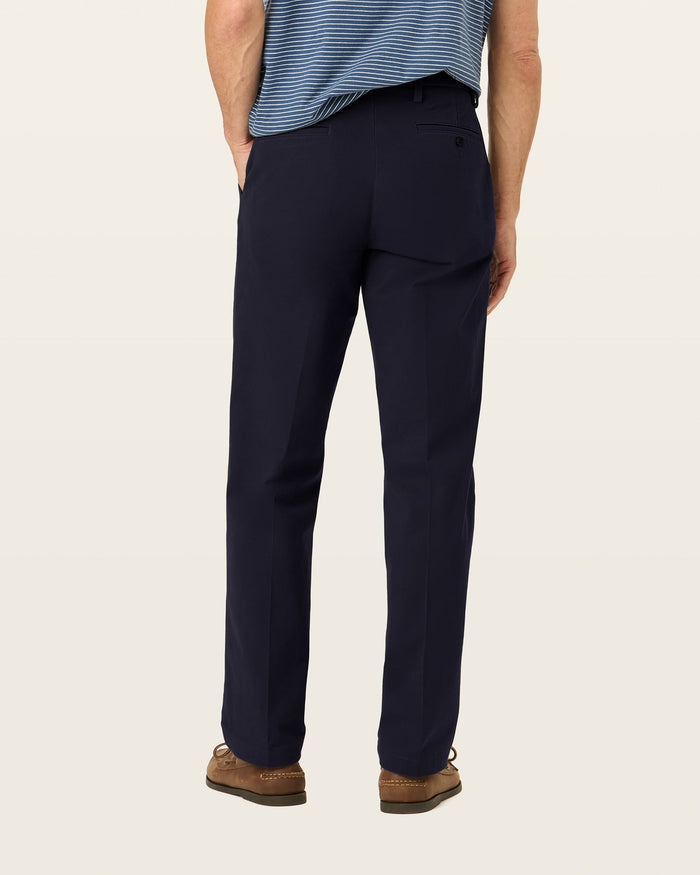 Back view of model wearing Pembroke Workday Khakis, Classic Fit.