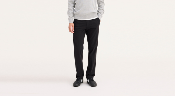 Front view of model wearing Black Workday Khakis, Slim Fit.