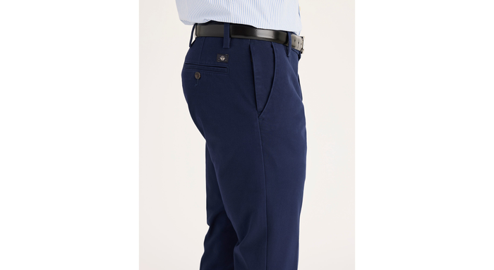 Side view of model wearing Pembroke Workday Khakis, Slim Fit.