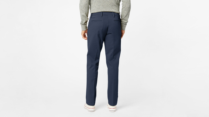 Back view of model wearing Pembroke Workday Khakis, Straight Fit.