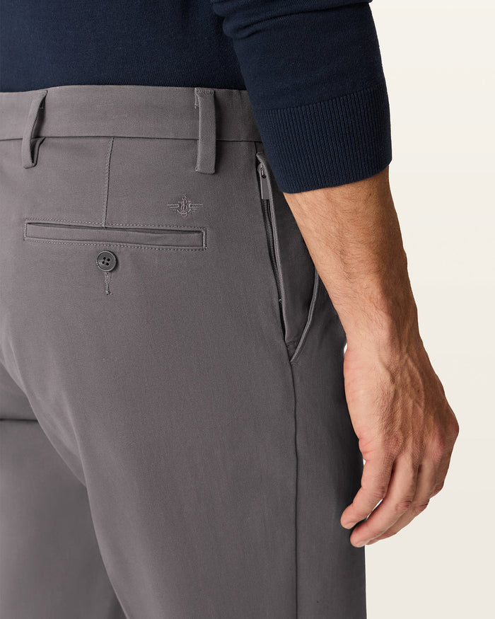View of model wearing Storm Workday Khakis, Straight Fit.